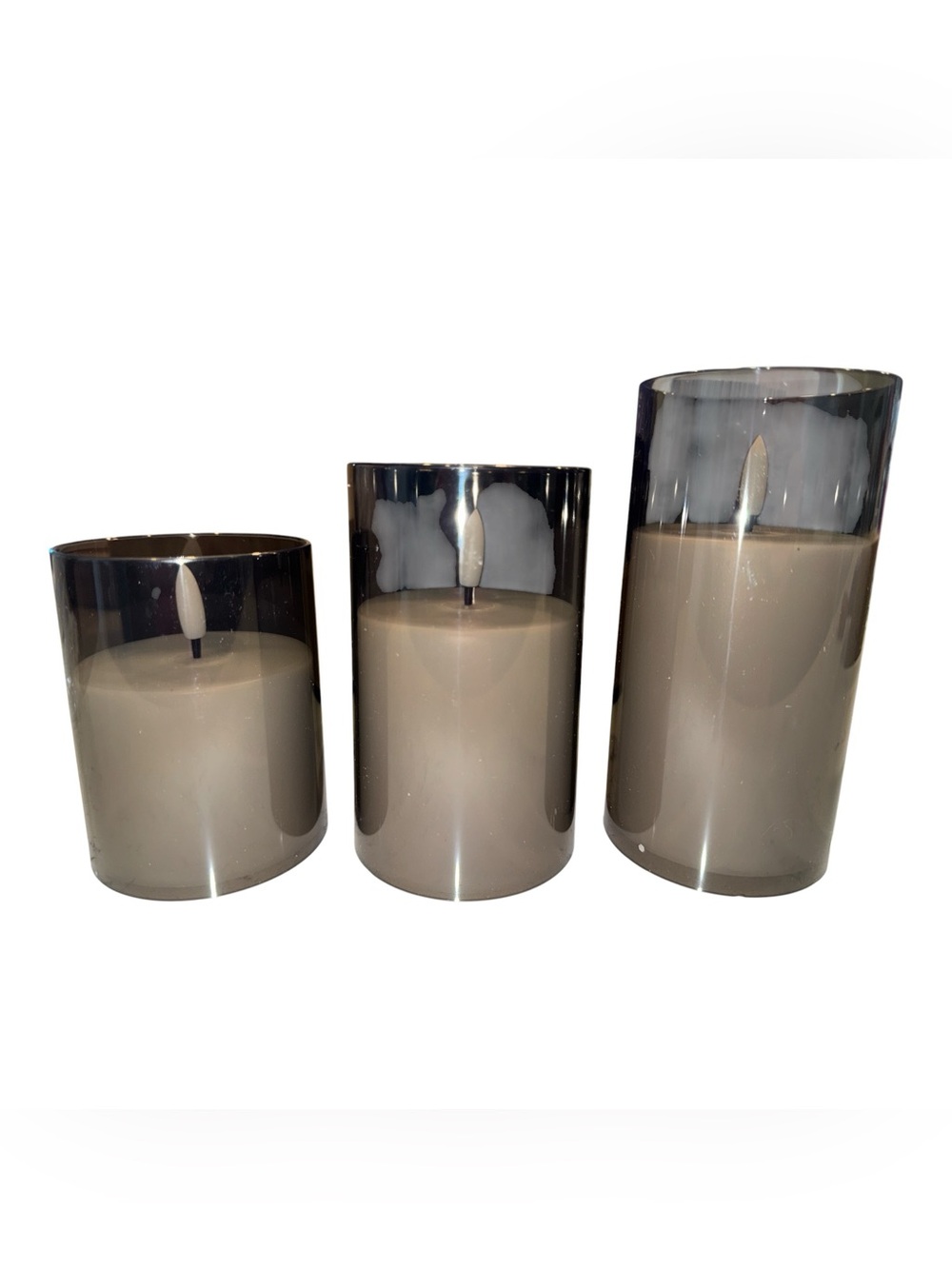 Set of three grey glass flameless LED pillar candles